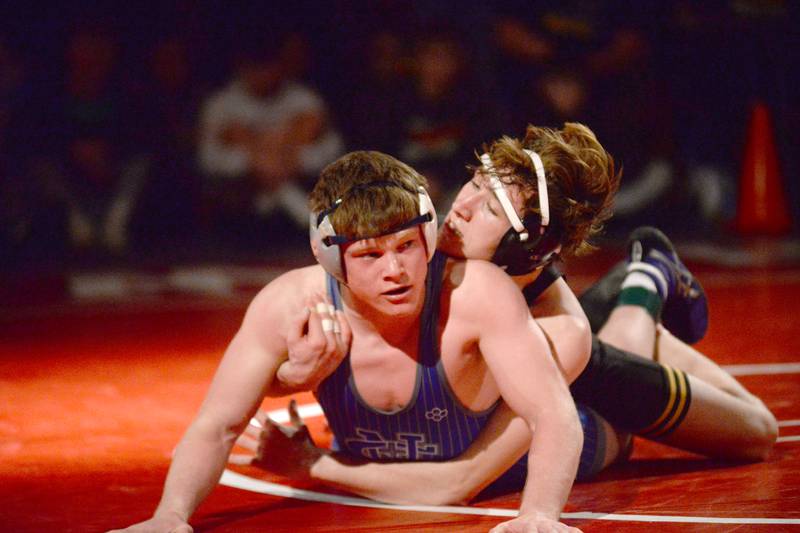 Riverdale’s Blake Smith (top) and Sterling Newman’s Briar Ivey wrestle at 157 pounds in the finals at the 1A Oregon Sectional on Saturday, Feb. 15, 2025.