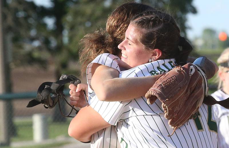St. Bede's Ava Balestri hugs teammate Lily Bosnich after defeating Illinois Valley Central during the Class 2A Regional final on Friday, May 23, 2025 at St. Bede Academy.