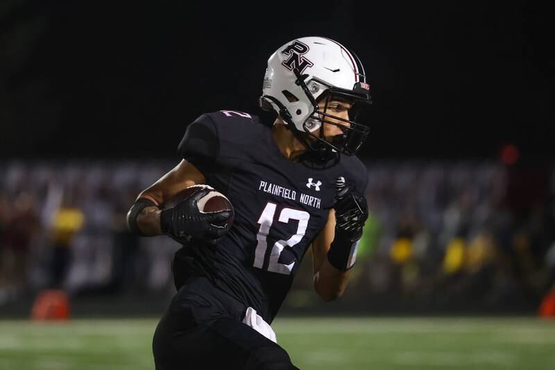 Plainfield North’s Sean Schlanser breaks away after a catch against Plainfield South. Thursday, Sept. 15, 2022, in Plainfield.