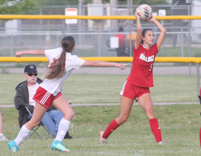 Streator's Alyssa Arambula throws in the ball over Ottawa's Taylor Brandt during the Class 2A Regional game on Friday, May 10, 2024 at James Street Recreation Complex in Streator.