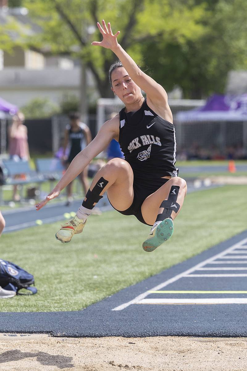 Rock Falls’ Carli Kobbeman looks to land her long jump attempt Thursday, May 11, 2023 at the class 2A Sterling girls track sectionals.