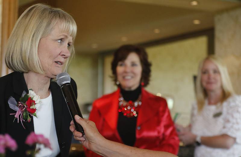 Award recipient Debbie Gallagher speaks during the Northwest Herald's Women of Distinction award luncheon Wednesday June 7, 2023, at Boulder Ridge Country Club, in Lake in the Hills. The luncheon recognized 10 women in the community as Women of Distinction.