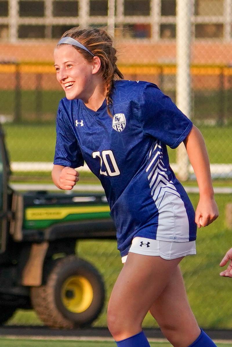 Geneva’s Caroline Madden (20) smiles after scoring a goal on a header against Glenbard East during a Class 3A Glenbard East Regional semifinal soccer match at Glenbard East High School in Lombard on Tuesday, May 14, 2024.