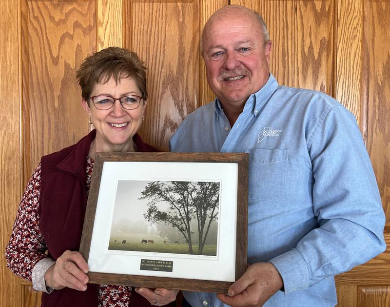 (Left to right); Bernadine and Jim Schielein, accepting the Distinguished Service Award