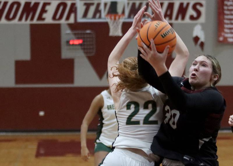 Marengo’s Macy Noe grabs a rebound against St. Edwards in IHSA Regional Championship girls basketball on Thursday, Feb. 19, 2026, at Marengo High School in Marengo.