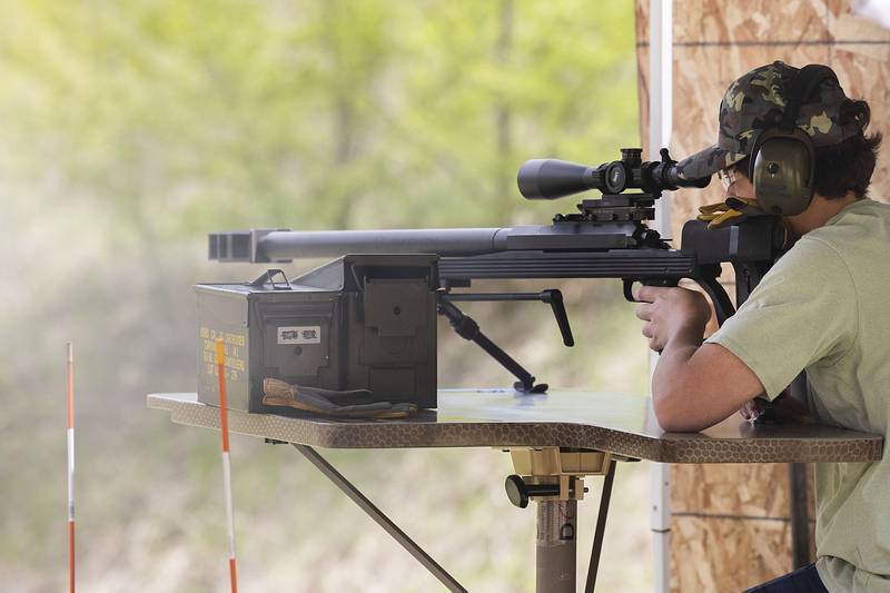 Ethan Roe of Milwaukee fires by far the most powerful gun Saturday, May 6, 2023 at the Tri-County Gun Club grounds, a .50-caliber rifle.