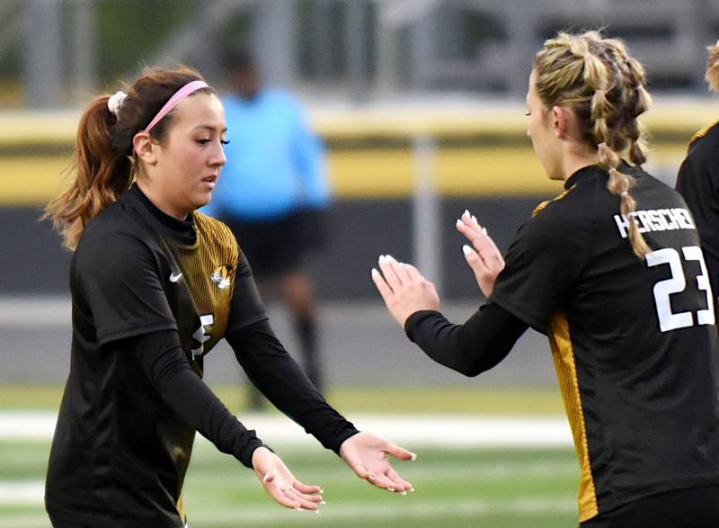 Herscher's Gianni Jaime, left, celebrates with Sophie Venckauskas after assisting Venckauskas' goal during a home game against Manteno Tuesday, May 5, 2026.