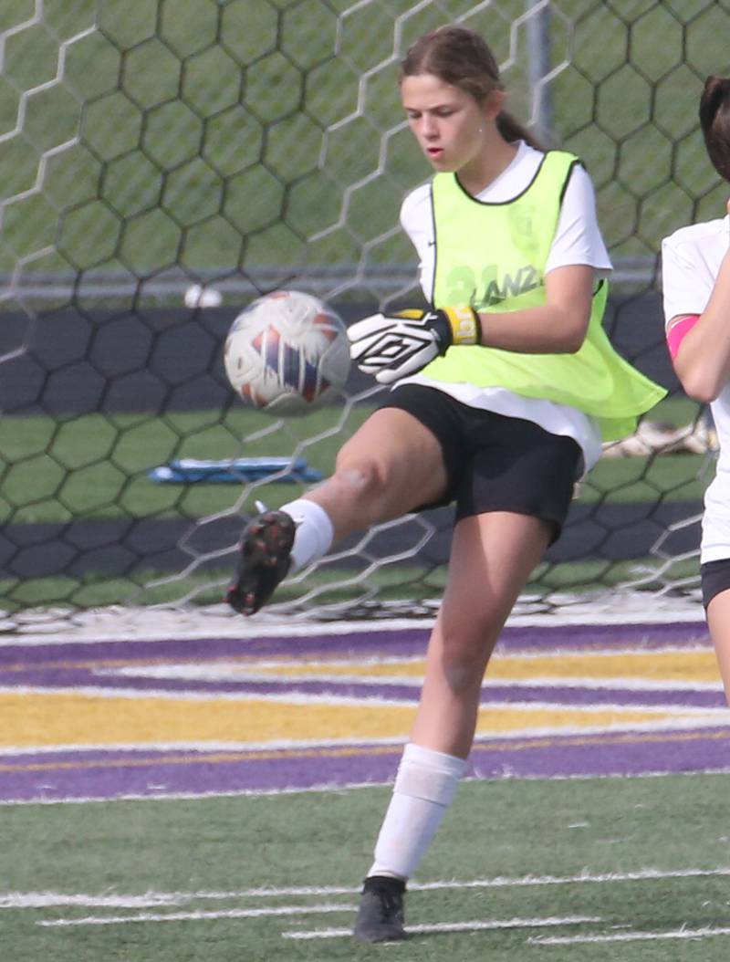Dixon's keeper Zoey Williams boots the ball out of the box on Wednesday, May 1, 2024 at Mendota High School.