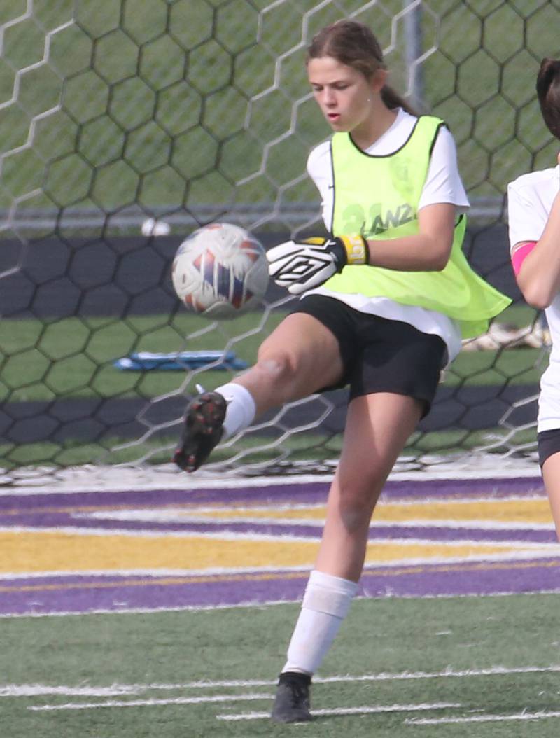 Dixon's keeper Zoey Williams boots the ball out of the box on Wednesday, May 1, 2024 at Mendota High School.