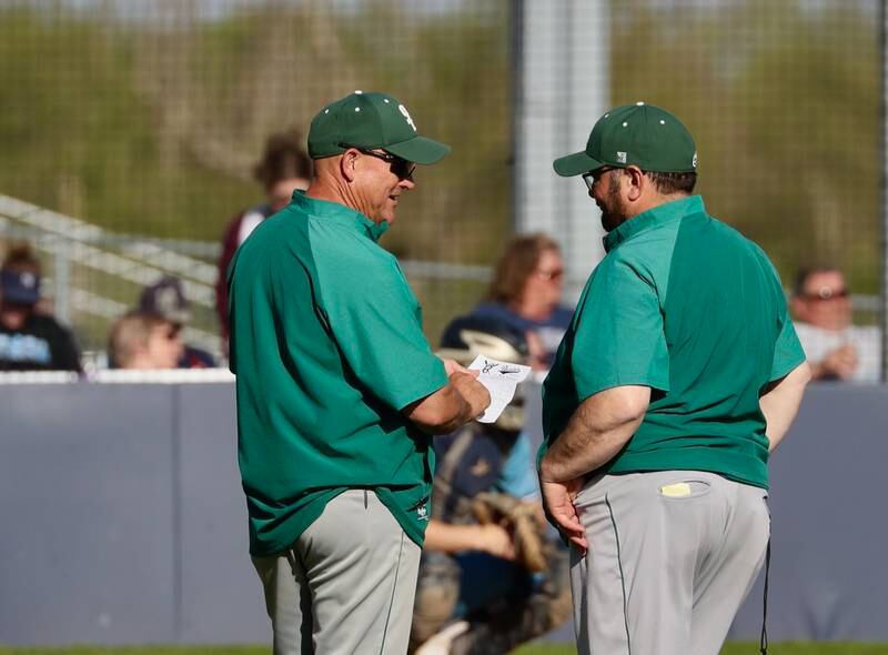 St. Bede baseball coach Bill Booker (left) talks to assistant coach Mike Bima on Thursday, May 4, 2023 in Manlius. Booker earned his 500th career victory with a 10-8, 8-inning victory over Bureau Valley.