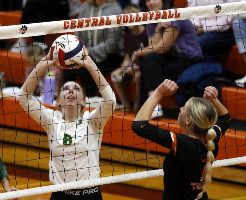Crystal Lake South's Anna Hougas sets the ball in front of Crystal Lake Central's Rebecca Kuehn during the IHSA Class 3A Crystal Lake Central Regional volleyball final on Oct. 31, 2024, at Crystal Lake Central High School.