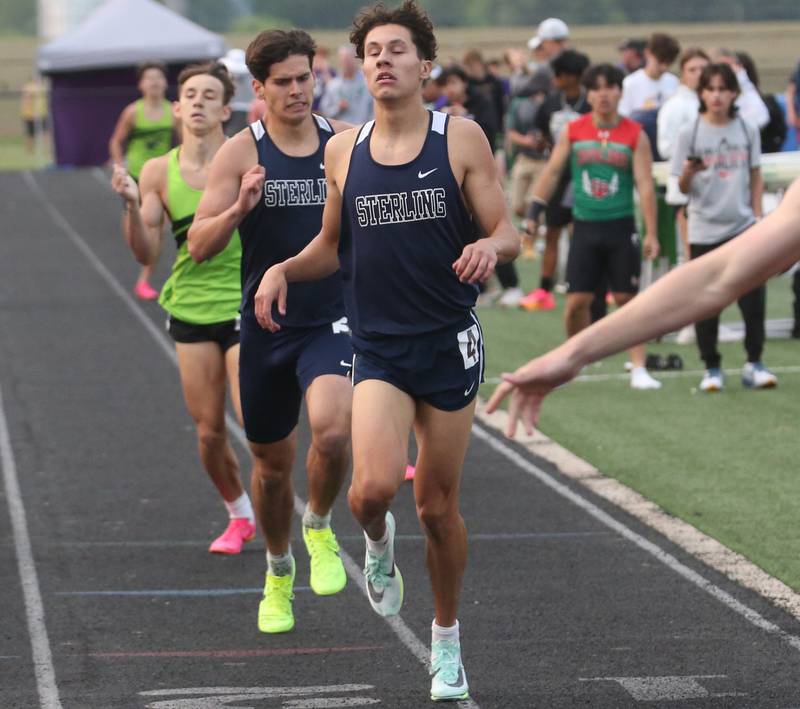 Sterling's Owen Anderson and Thomas Holcomb compete in the 800 meter run during the Class 2A track sectional meet on Wednesday, May 17, 2023 at Geneseo High School.