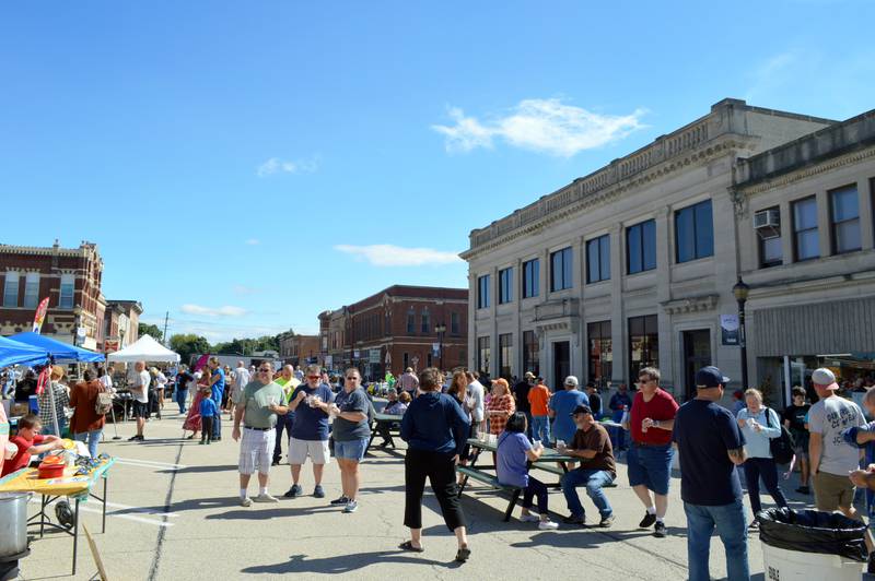 People wander around the 100 block of West Mason Street on Saturday, Sept. 28, 2024, during the Polo Chili Cook-Off and Block Party. This was the first year the event was held in the city's downtown area.