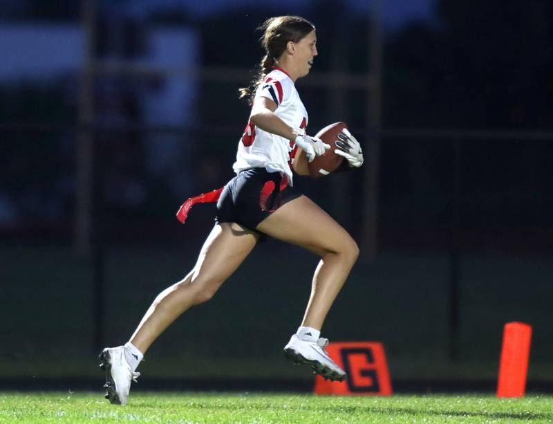 Huntley’s Evelyn Freundt cruises into the end zone with a touchdown in varsity flag football at Owen Metcalf Field on the campus of Crystal Lake Central High School in Crystal Lake on Tuesday, Sept. 16, 2025.