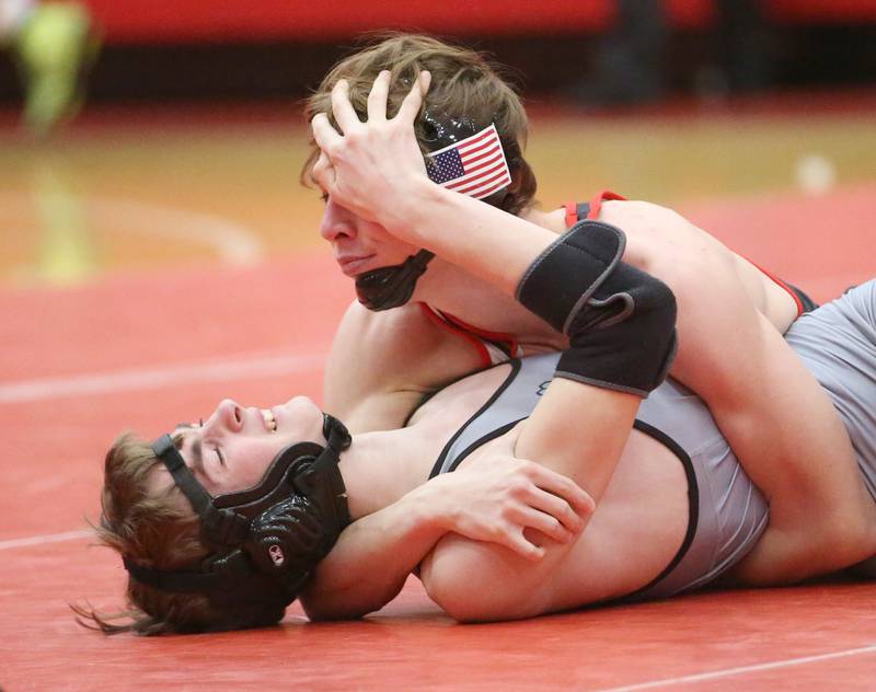 Ottawa's Wyatt Wheeler wrestles Sandwich's on Thursday, Jan. 12, 2023 in Kingman Gymnasium at Ottawa High School.