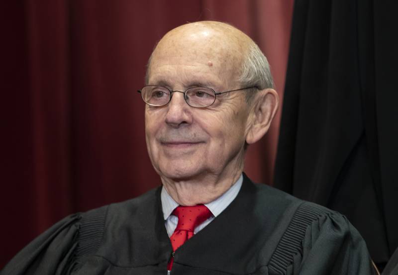 FILE - Supreme Court Associate Justice Stephen Breyer, appointed by President Bill Clinton, sits with fellow Supreme Court justices for a group portrait at the Supreme Court Building in Washington, Nov. 30, 2018. Breyer is retiring, giving President Joe Biden an opening he has pledged to fill by naming the first Black woman to the high court, two sources told The Associated Press Wednesday, Jan. 26, 2022. (AP Photo/J. Scott Applewhite, File)