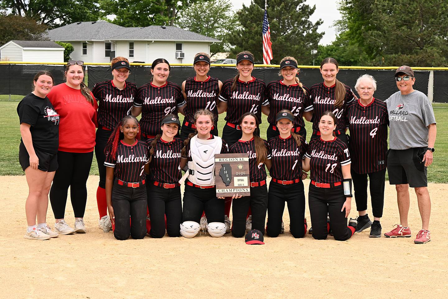 The Henry-Senachwine softball team poses with its plaque after winning the Class 1A Henry-Senachwine Regional title game on Friday, May 22, 2026.