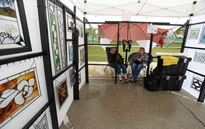 (left) Wendy Salinas and Sue Pasetti of Cortland sell stain glass  art work during the Art Fest held Sunday Sept 11, 2022.