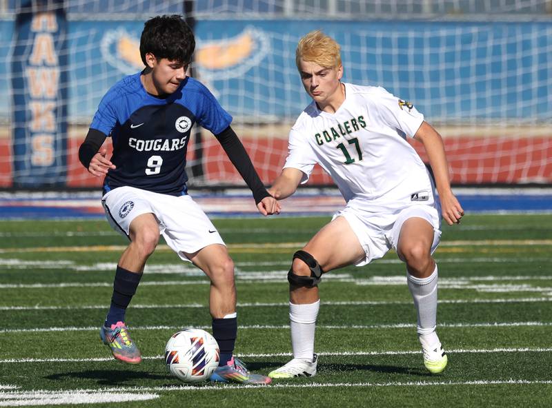 Coal City's Adrian Dames and Chicago Academy's Nathan Salgado try to win possession Friday, Nov. 7, 2025, during their Class 1A state third place game at Hoffman Estates High School.