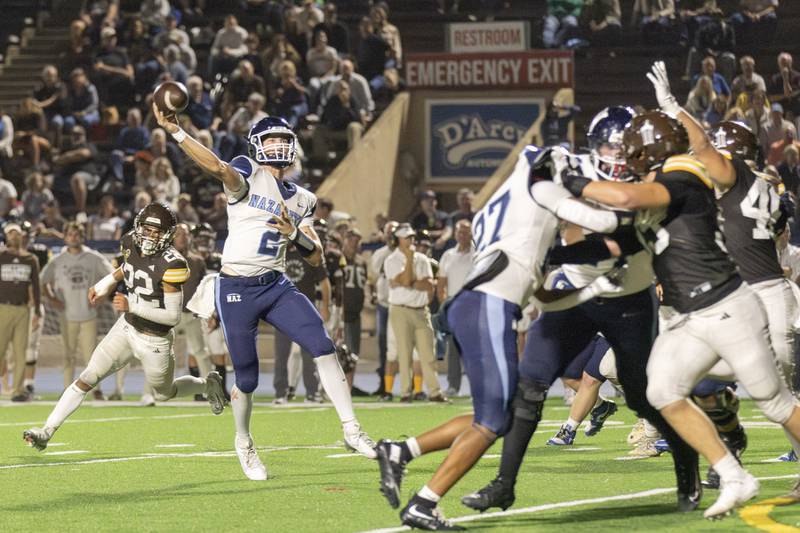 Nazareth's Jackson Failla throws a pass during the Roadrunners' game with Joliet Catholic on Friday, Sept. 26, 2025.