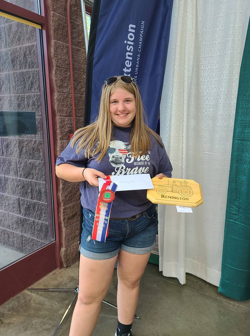 Serenity Stone, Zearing 4-H Club, displays her Visual Arts: Wood project which received Reserve honors at the Illinois State Fair on August 13th, 2022.