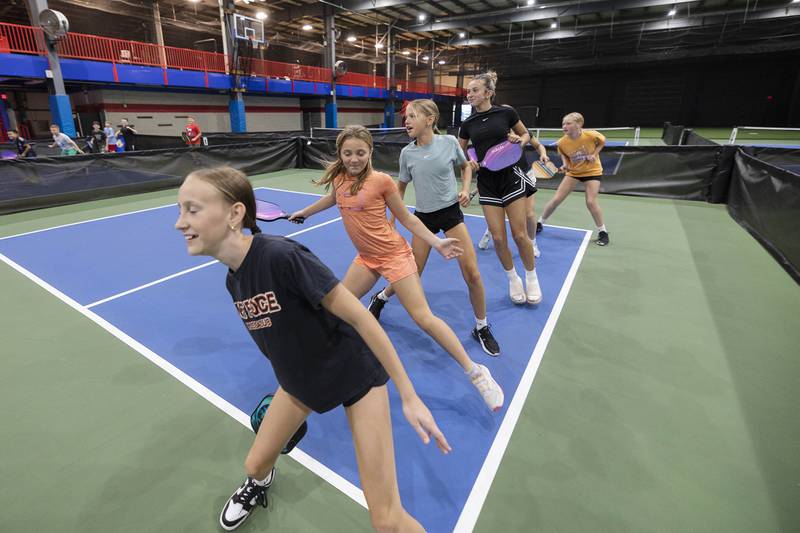 St. Anne’s students warm up Wednesday, Sept. 17, 2025, before playing pickleball at Westwood.