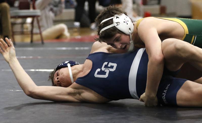 Crystal Lake South’s Nathan Randle controls Cary-Grove’s Ignacio Santander in a 132-pound semifinal match of the IHSA 2A Antioch Wrestling Regional on Saturday, Feb. 8, 2025, at Antioch High School.