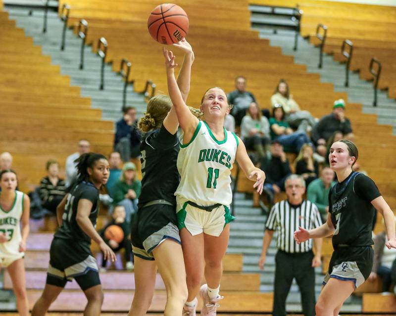 York's Briley O' Brien (11) puts up a shot in their York Thanksgiving Tournament game between Oswego East at York on Monday, Nov 18, 2024  in Elmurst.