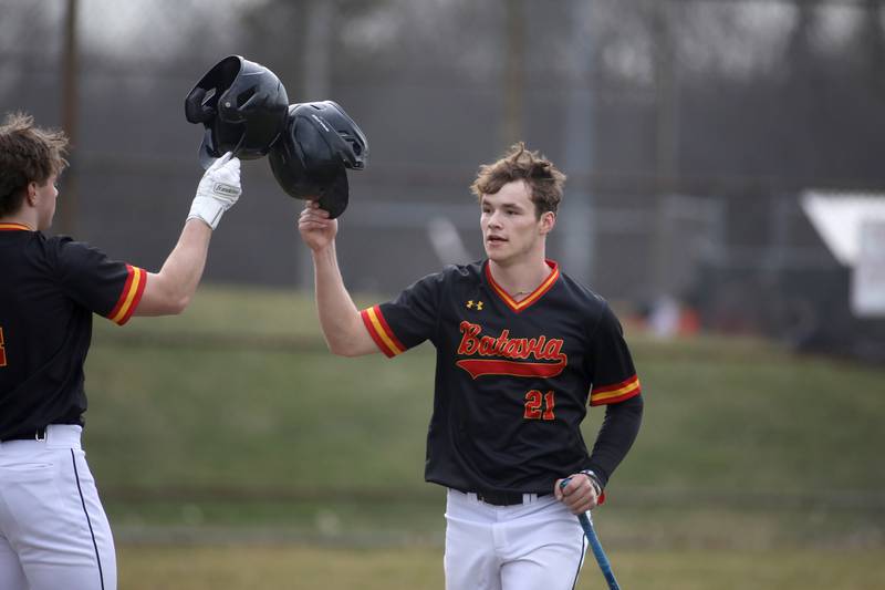 Batavia’s Ryan Boe scores a run during a game against Glenbard West at Village Green Park in Glen Ellyn on Wednesday, March 13, 2024.