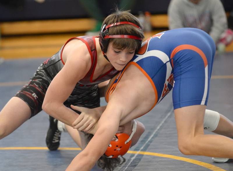 Fulton's Easton Spooner (left) wrestles Genoa-Kingston's Jakob Rutkowski at 126 pounds at the Polo Wrestling Invitational on Saturday,  Jan. 11, 2025 at Polo High School. He finished fifth.