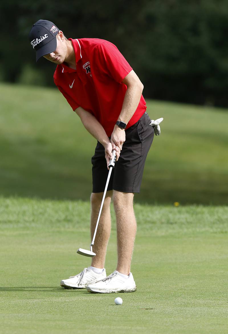 Huntley’s Nathan Elm putts on the seventh green during the Fox Valley Conference Boys Golf Tournament Thursday, Sept. 21, 2023, at McHenry Country Club in McHenry.