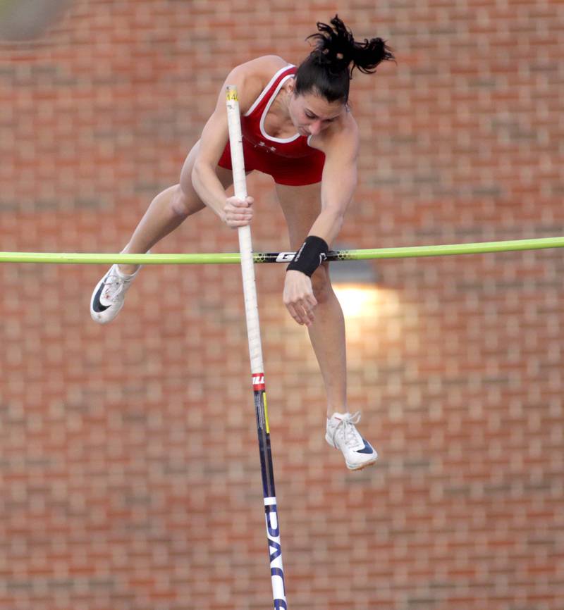 Naperville Central’s Kait McHale competes in the pole vault during the Ritter Invite girls track and field meet at Downers Grove North on Friday, April 14, 2023.