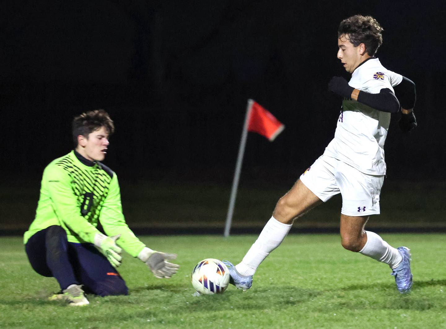 Mendota's Cesar Casas tries to get the ball by Harvest-Westminster goalie Luke Bartolome Friday, Oct. 31, 2025, during the Class 1A Indian Creek Sectional championship game Friday in Waterman.