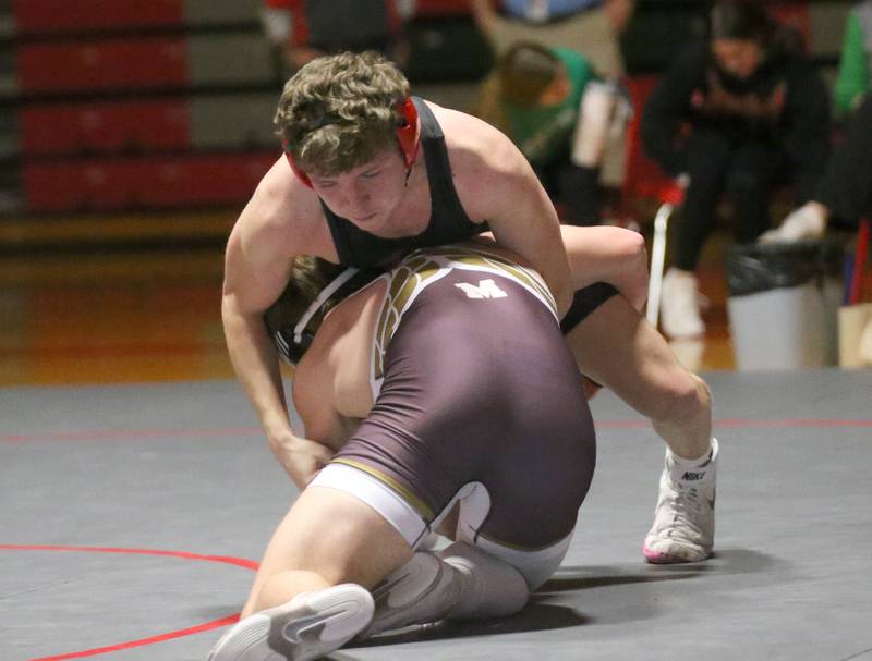 L-P's  Josh Bickford wrestles Morris's AJ Franzetti on Thursday, Jan. 11 2024 in  Sellett Gymnasium.