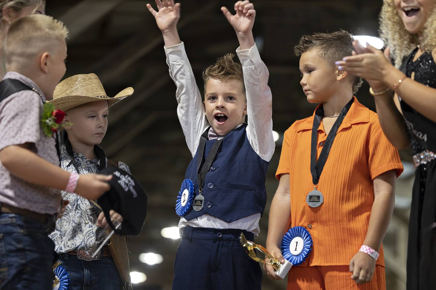Little Mister Ogle County contestant Jaxson King celebrates winning the title Thursday, July 30, 2025, at the Ogle County Fairgrounds.