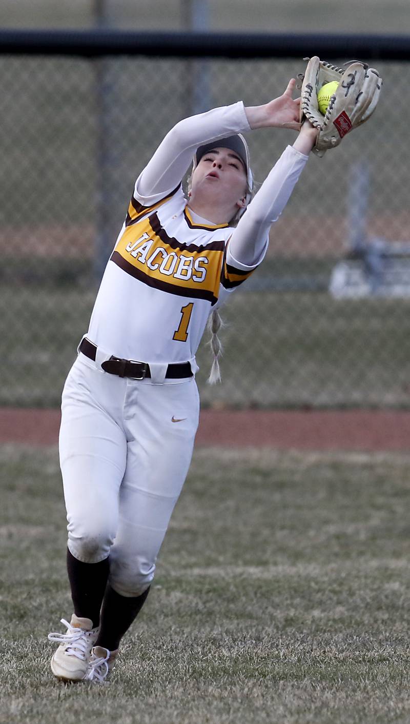 Jacobs’s Jianna Tanada catches a fly ball during a nonconference softball game against Palatine Monday, March 20, 2023, at Palatine High School.