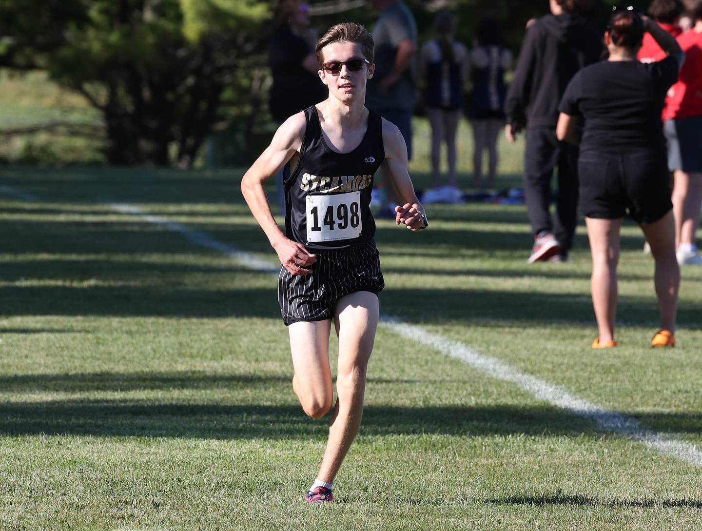 Sycamore’s Logan Jones finishes his race Tuesday, Sept. 3, 2024, during the Sycamore Cross Country Invite at Kishwaukee College in Malta.