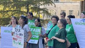 Photos: Northern Illinois University union workers march for higher pay, meet with president Lisa Freeman