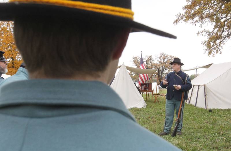 Scott Gutzke, of Gurnee (Sergeant Major with the 1st Illinois Battalion) talks with his soldiers before they fight in the Battle of Gettysburg during Hainesville’s Civil War Encampment & Battle at the Northbrook Sports Club on October 21st in Hainesville. 
Photo by Candace H. Johnson for Shaw Local News Network