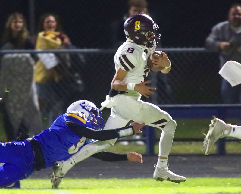 Richmond-Burton’s Joseph Larsen breaks a tackle on a long punt return run against Aurora Central Catholic in IHSA football Class 3A second-round playoff action at Bob Stewart Field on the campus of Aurora Central Catholic High School in Aurora on Friday, November 7, 2025.