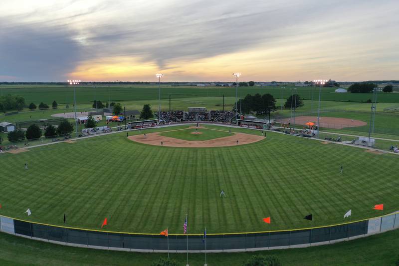 The sun sets over Schweickert Stadium on opening night of the Pistol Shrimp baseball on Thursday, May 30, 2024 at Veterans Park in Peru.