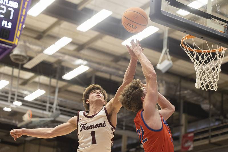 Eastland’s Braden Anderson has a shot blocked by Tremont’s Levi Hendrickson Monday, March 9, 2026, in the Class 1A Macomb Supersectional.