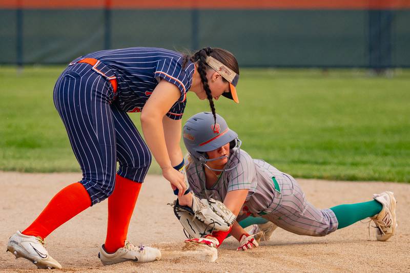 Lasalle Peru High School's Karmen Piano looks to the umpire for the call after sliding into second base during the Illinois Class 3A regional game on May 30, 2025 at Pontiac High School.
