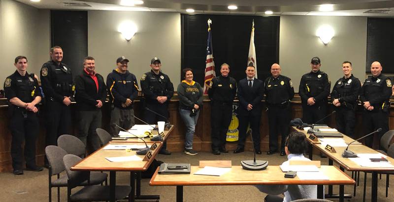 Joseph Pienta (fifth from right) was sworn in to the Peru Police Department on Monday, Jan 3, 2023.