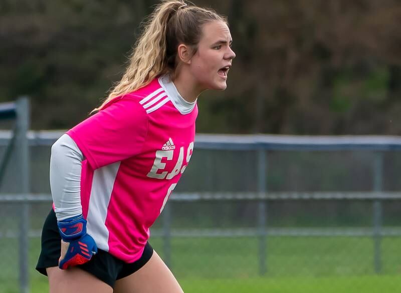 Oswego East's Samantha McPhee (7) shouts out instructions to her team during a soccer match against Oswego at Oswego High School on Monday, May 2, 2022.