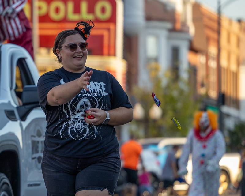 Jessica Burrows throws candy to kids at the annual Princeton Halloween Parade on Saturday, Oct. 4, 2025 on Main Street in Princeton.