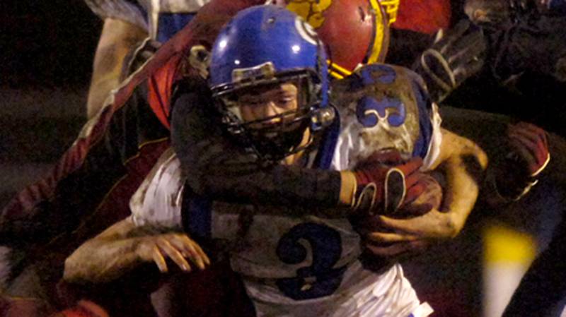 Geneva’s Jay Graffagna runs through the middle during the Vikings’ 23-0 victory over Batavia on Friday. The Vikings shared the Western Sun Conference title with Glenbard South, as both teams finished with dual 6-1 records. Sandy Bressner – sbressner@kcchronicle.com