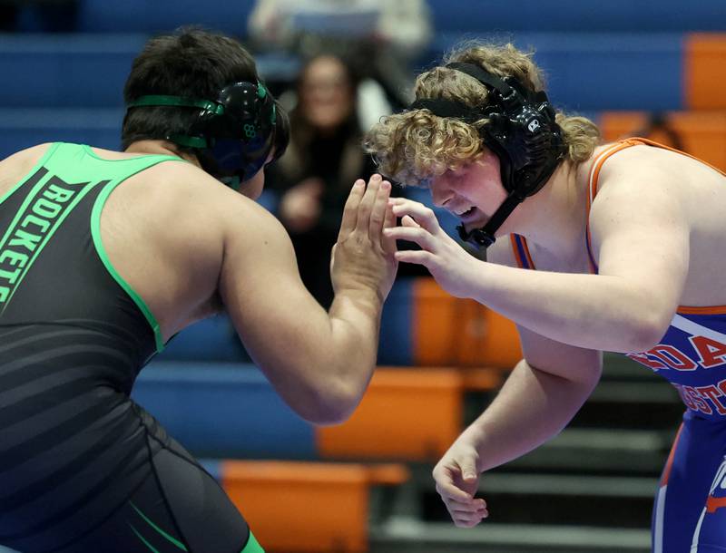 Genoa-Kingston's EJ Kennedy wrestles Rock Falls’ Zachary Walker Thursday, Jan. 16, 2025, during their 215 pound match at Genoa-Kingston High School.