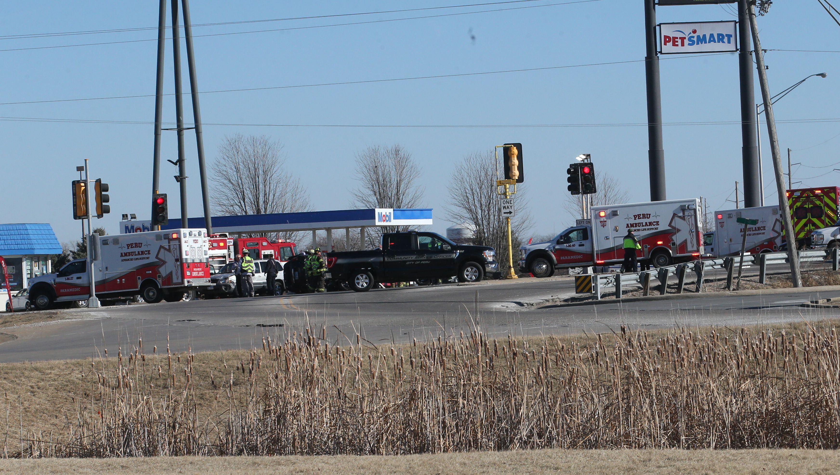 Emergency crews work the scene of a multiple vehicle crash at the intersection of Illinois Route 251 and May Road on Monday, Jan. 27, 2025 in Peru. The crash happened around 12:45p.m. Ambulances from Peru, La Salle, Mendota Spring Valley, and Oglesby responded to the scene to transport multiple victims to area hospitals.