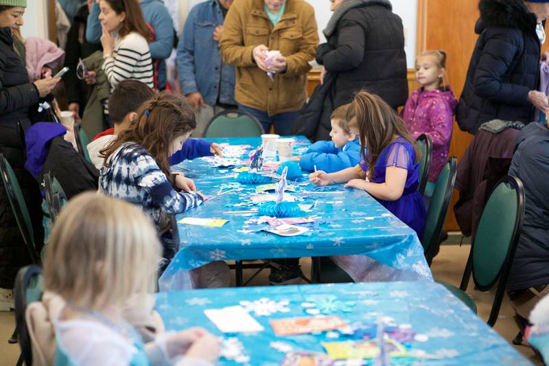 Families gather for crafts at Frozen Fest at Maryknoll Park on Saturday, Jan. 11, 2025 in Glen Ellyn.